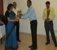 Felicitation and welcome of Hon. Dr. U. J. Joshi, Principal, K. M. Kundnani College of Pharmacy, Mumbai by Hon. Mr. Achyut Sawantbhonsale  